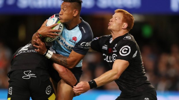 Israel Folau scored two tries in defeat for the Waratahs.