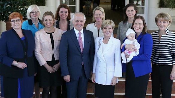 "Fifty-fifty the ideal": Malcolm Turnbull with the female members of his cabinet.