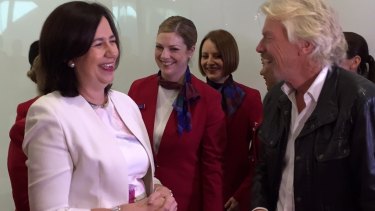 Queensland Premier Annastacia Palaszczuk - who received a kiss on her hand from the charismatic business leader - scoffed at suggestions she may have felt miffed at being called one of the girls on the stage.