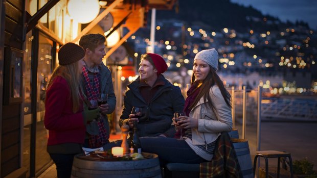 After dark, Queenstown slips into party mode. 