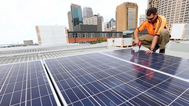 Solar panels being installed at the Sydney Town Hall.