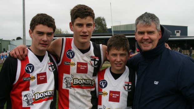 Family unit: Jarrod Berry (second from left) with his brothers, Joel and Thomas, and dad Troy.