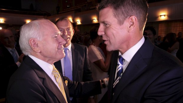 Backing Baird: Former prime minister John Howard (left) with Prime Minister Tony Abbott and NSW Premier Mike Baird.