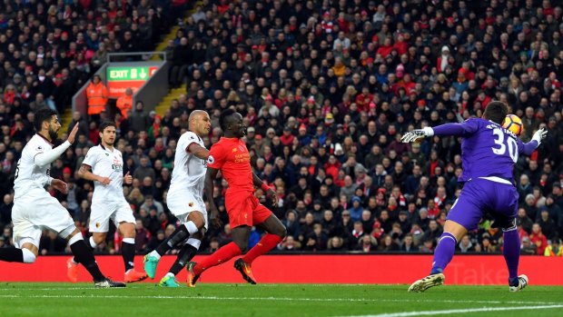 Liverpool's Sadio Mane scores his side's fifth goal against Watford at Anfield on Sunday.