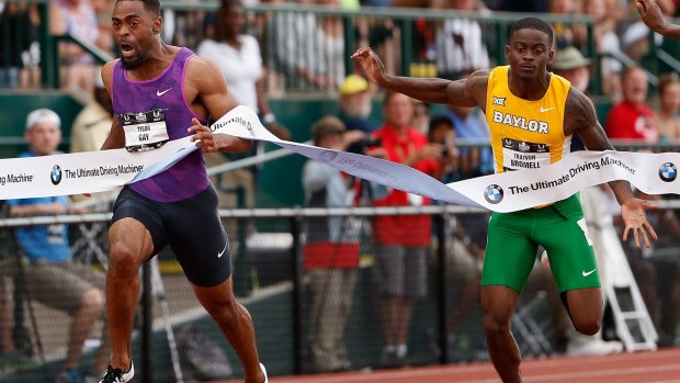 Teen star: Trayvon Bromell (R) is just pipped by Tyson Gay.