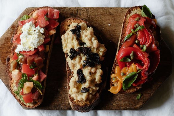 From left: Bruschetta with tomatoes mint and ricotta; cannellini beans, black olives and salami; peppers, capers and basil.