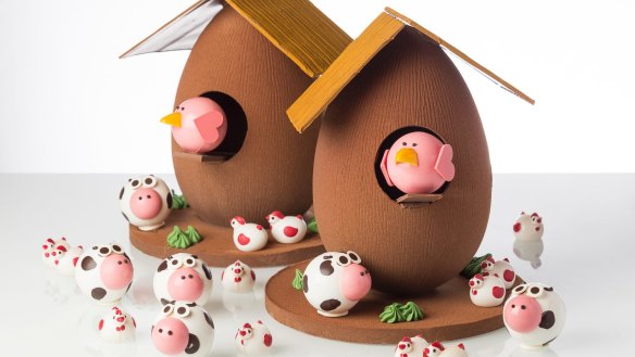 Burch & Purchese's Coop de Ville chocolate egg coop complete with roof, chicken and frolicking playmates, $280.