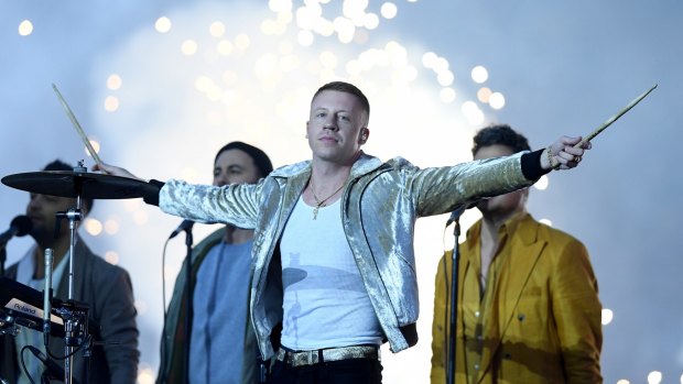 Macklemore performs during the NRL grand final.