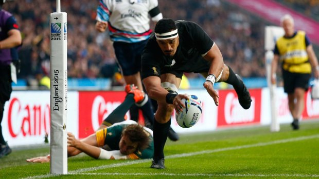 New Zealand's Jerome Kaino scores the opening try.