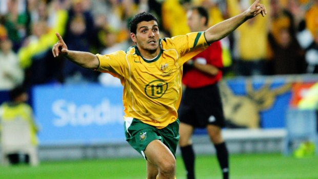 Iconic moment: John Aloisi celebrates scoring the goal that sent the Socceroos to the World Cup.