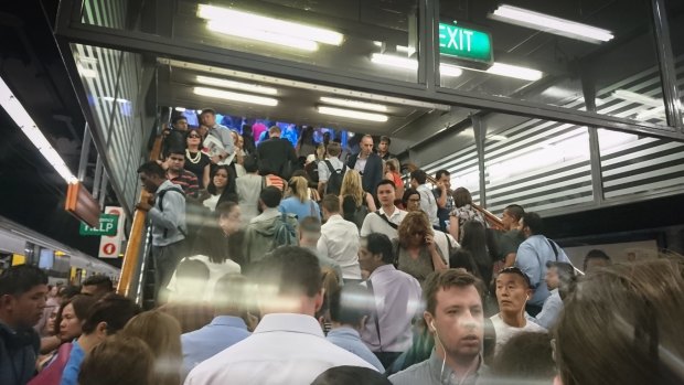 Commuters crowd on the platforms at Town Hall station after power failure.