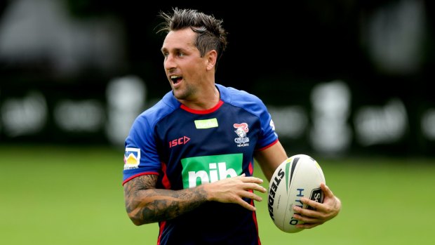 Ball in hand: Mitchell Pearce on the training paddock with the Knights for the first time.