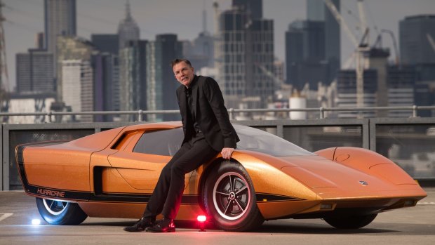 Michael Simcoe, seen here with the 1969 Holden Hurricane, says we'll be seeing driverless cars  within 'a year or so'.  