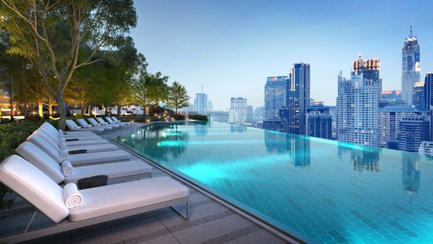 The infinity pool flanked by terraced gardens.