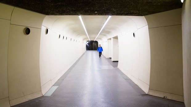  A futuristic tunnel leading to Museum Station in Sydney. 