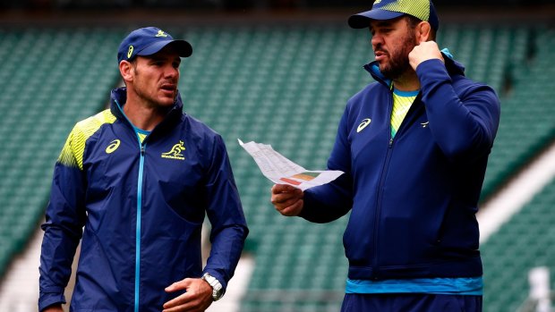 Spy claims: Michael Cheika with the piece of paper which revealed the Wallabies' tactics.