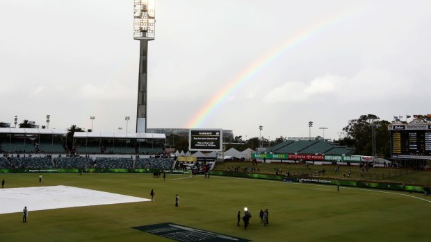 Rainbow connection: Play abandoned with England trailing by 127 runs with six wickets remaining.