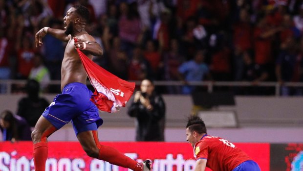 Costa Rica's Kendall Waston, left, after he scored against Honduras.