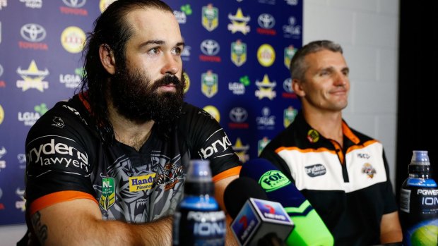 Job done: Ivan Cleary looks satisfied as he and skipper Aaron Woods speak with the media in Townsville.