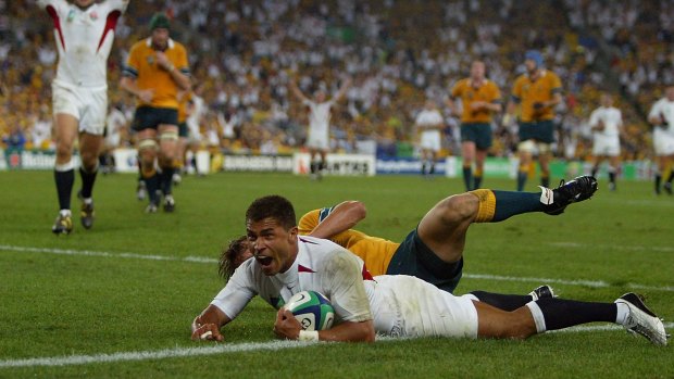 High point: Jason Robinson scores for England in the World Cup final against Australia in Sydney in November 2003.