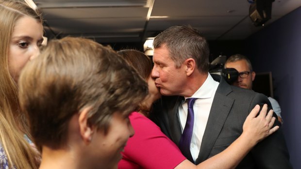The Premier's "lifeline": Mike Baird kisses his wife, Kerryn.