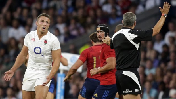 Letter of the law: Sam Burgess is penalised during his England debut against France.