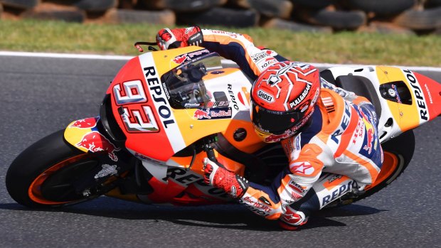 Fully committed: Marc Marquez corners his Honda during the Australian MotoGP at Phillip Island.