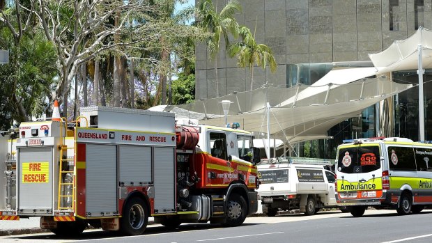Emergency services are seen attending 1 Eagle Street after the ceiling collapse.
