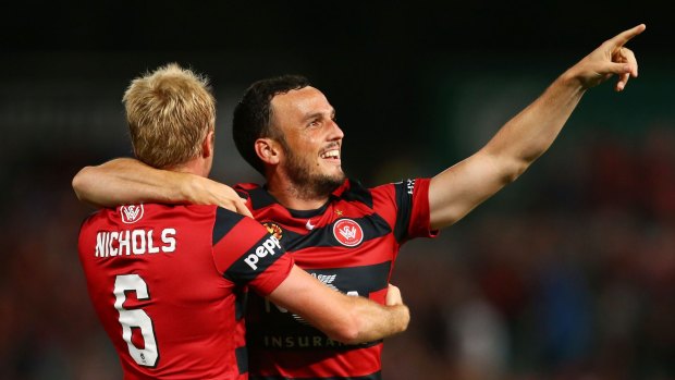 Happy days: Mark Bridge grabbed the first goal as the Wanderers saw off Victory 2-0.