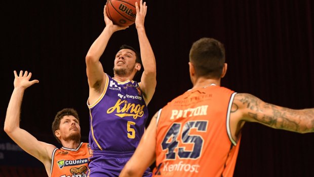 Century stand: Jason Cadee will take the court for the Sydney Kings for the 100th time on Sunday.
