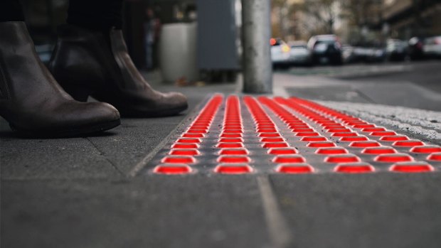 Buro North's Smart Tactile Paving warns distracted pedestrians when to stop.