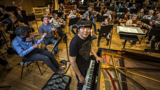 Chinese concert pianist Lang Lang rehearsing with the Queensland Symphony Orchestra.