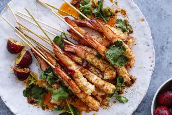 Prawn skewers with lemon myrtle butter and blood limes (right).