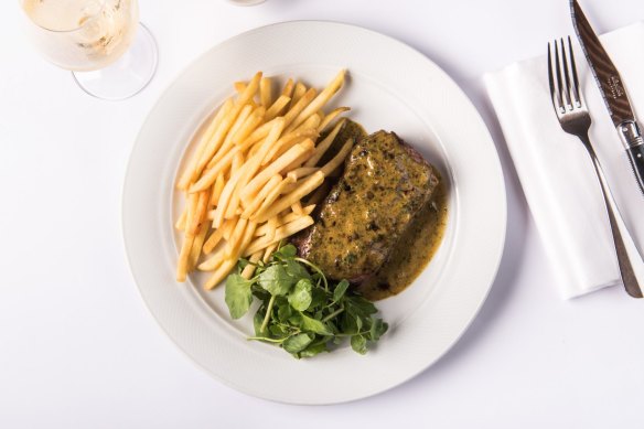 Grilled sirloin, cafe de paris butter and frites at Bistro Moncur, Woollahra.