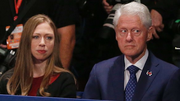 Former President Bill Clinton, with daughter Chelsea, looked uneasy throughout the debate.