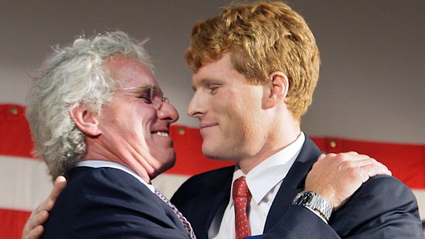 Joseph Kennedy II, left, hugs his son, Joseph Kennedy III after introducing him at campaign rally in 2010.