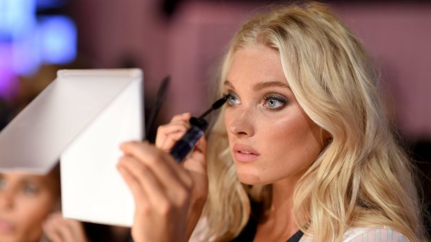 American model Lindsay Ellingson, knows what's up, mascara (not those ridiculous wings) is all you need to get ready for the annual Victoria's Secret show.