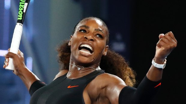 Serena Williams celebrates after defeating Lucie Safarova