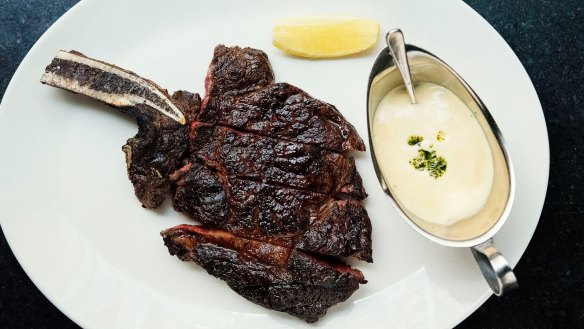 Rib-eye on the bone at Rockpool Bar &amp; Grill in Sydney.