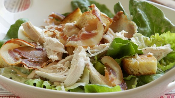 Caesar salad with barbecue chicken or chicken thighs.