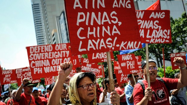 Anti-China protesters rally against China's territorial claims in the Spratlys group of islands in the South China Sea in front of the Chinese Consulate in Manila. 