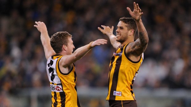 Ellis in his Hawthorn days with another ex-Hawk, Lance Franklin.