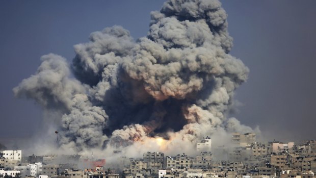 An explosion from an Israeli strike on July 29 rises over Gaza City.