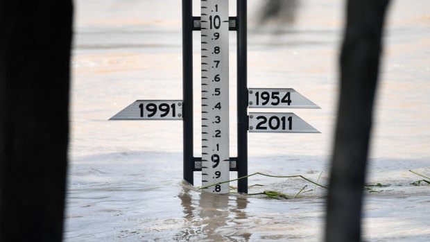 A flood gauge shows the Fitzroy River at 8.8m in Rockhampton on Thursday. It is forecast to peak at 9m.