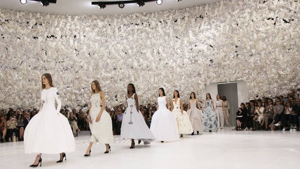 Front row at a Dior couture show in Paris is another money-can't-buy opportunity offered to high-value customers. 