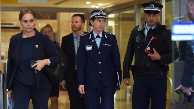NSW Police Deputy Commissioner Catherine Burn, centre, leaves after giving evidence at the Lindt cafe siege inquest on Tuesday.