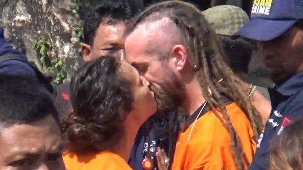 Sara Connor and David Taylor kiss in August during a police re-enactment of the events that led to the death of Wayan Sudarsa.