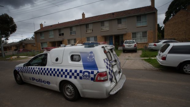 Police drive past the house in Perth Street, West Heidelberg where Sanaya Shaib had been living.