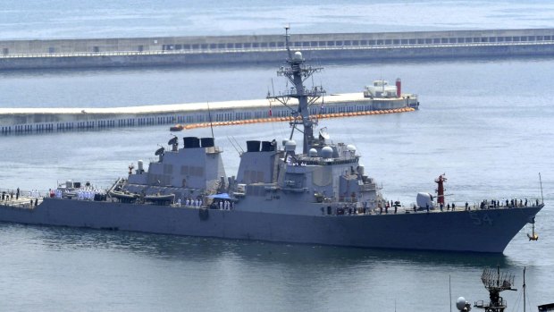 The USS Curtis Wilbur deliberately sailed near one of the Beijing-controlled islands in the hotly contested South China Sea. 