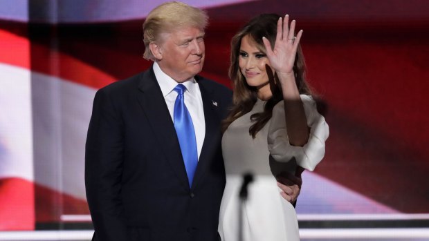  Donald Trump with wife Melania after her speech during the opening day of the convention.